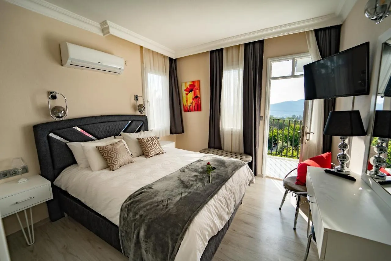 Carrington Suites Олудениз
